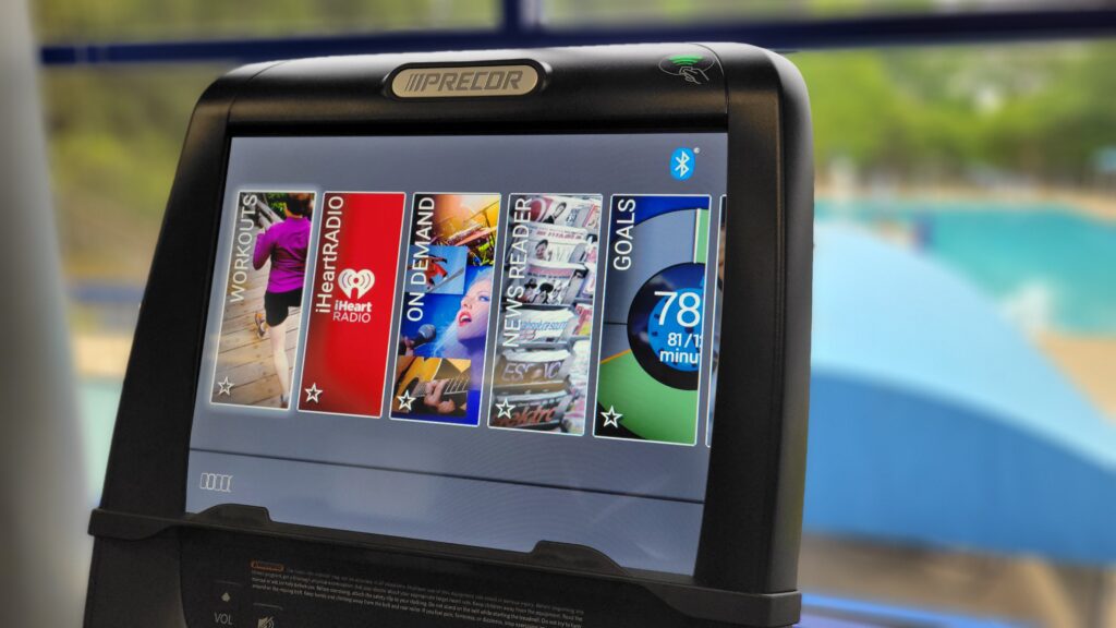 A treadmill display screen showing a number of options for programs