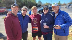 Five friends line up together for a photo after the 2025 Sam Lapidus Montclair Run