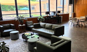 A picture of the lounge furniture in the library with the outdoor courtyard in the background